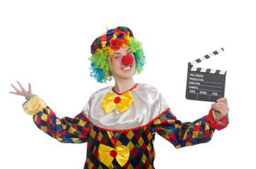 Clown with movie clapper isolated on white