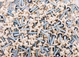 Many screws arranged as background
