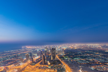 Fototapeta na wymiar Panorama of night Dubai during sunset