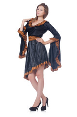 Young lady in gray dress isolated on white