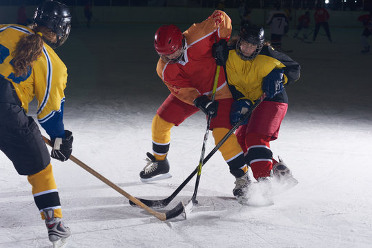 teen ice hockey sport  players in action