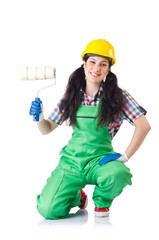 Female workman in green overalls isolated on white