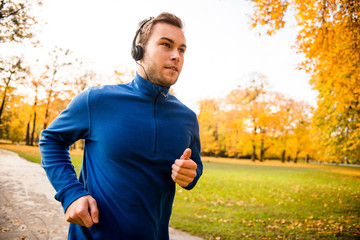 Man jogging and listening music
