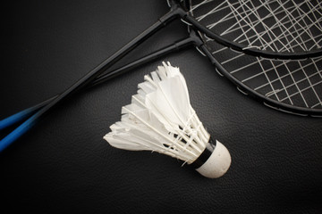 Shuttlecocks with badminton racket