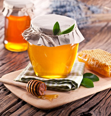 Glass cans full of honey.