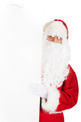 Santa Claus holding white blank sign