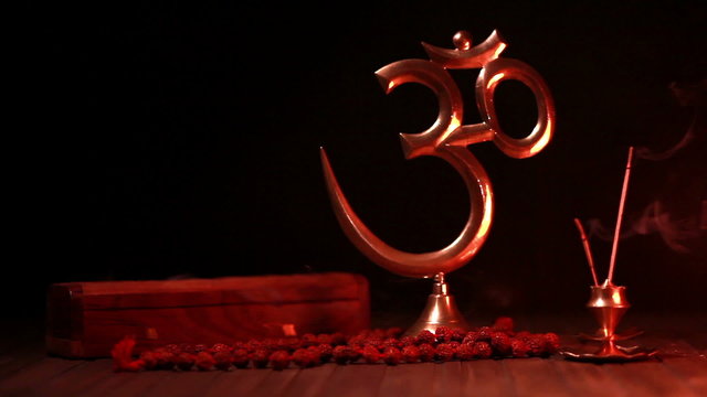 Om symbol and incense stick
