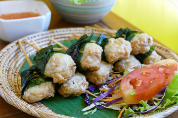 grilled pork wrapping with Wildbetal leafbush