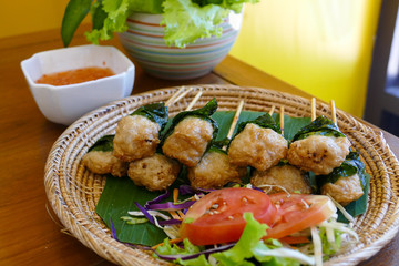 grilled pork wrapping with Wildbetal leafbush