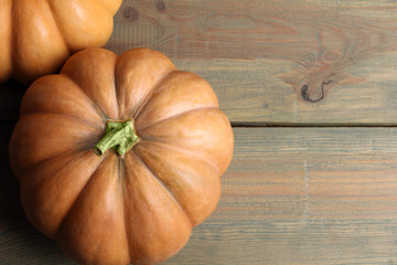 pumpkin on a brown wooden background