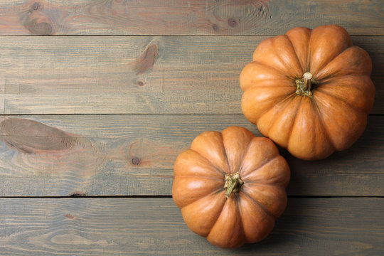 pumpkin on a brown wooden background