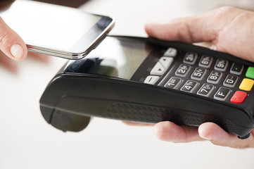 paying with NFC technology on mobile phone