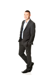 Obraz premium Businessman with hands in pocket