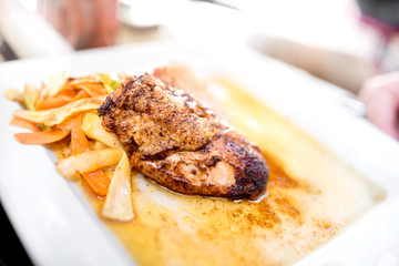 Fancy meals series - the art of cuisine with grilled chicken breast, stir-fried vegetables and noodles. Honey sauce for a spicy taste