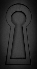 keyhole on a black background paper