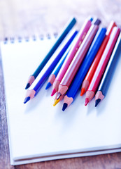 pencils and note
