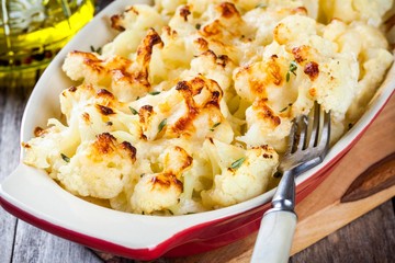 Cauliflower and cheese gratin in the baking dish closeup