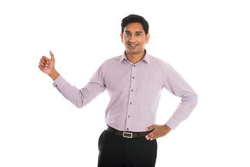 indian business male with thumbs up and smiling