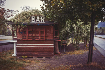 With ivy overgrown Bar, closed due to rain
