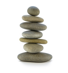 Sea stones stacked tower symbolizing balance