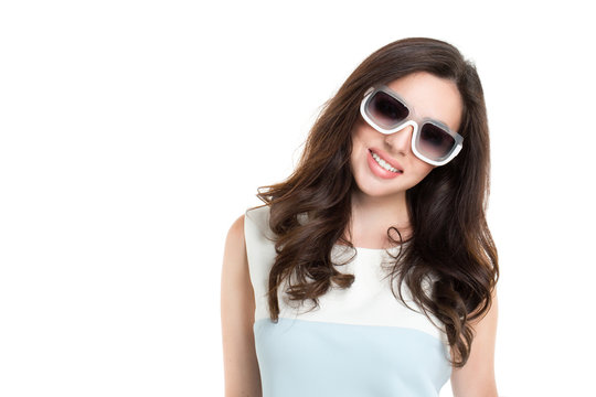 Portrait of young beautiful woman wearing white sunglasses.