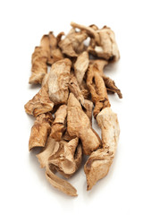 Row of Organic Sour dried mango or Aamchur or Amchoor (Mangifera indica) isolated on white background.