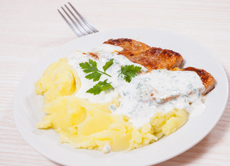 meat with mashed potatoes and sauce