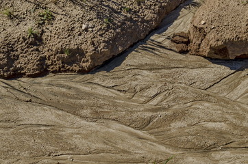 Dried land with drawing after flood rain in the field, Plana mountain, Bulgaria 