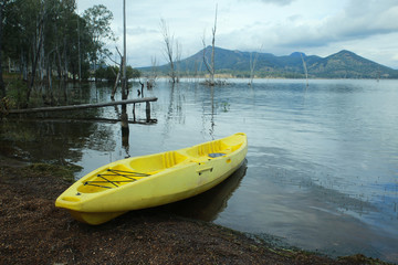Fototapeta na wymiar Yellow Kayak at Lake Moogerah Australia