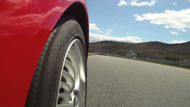 POV racing shot from front right wheel