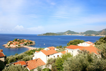 Fototapeta na wymiar Sveti Stefan island in Budva, Montenegro, Balkans. Sea view. Adriatic sea. Riviera