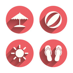 Beach holidays icons. Umbrella and sandals.