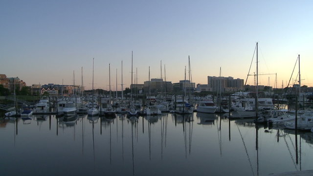Boats docked at sunrise