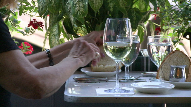 Eating bread with wine at a Bistro