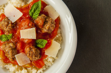 Delicious meatballs made from ground beef in a spicy tomato sauce