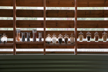 Jars decoration on wooden wall