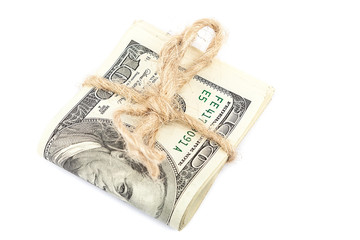 Roll of dollar banknotes on white background.
