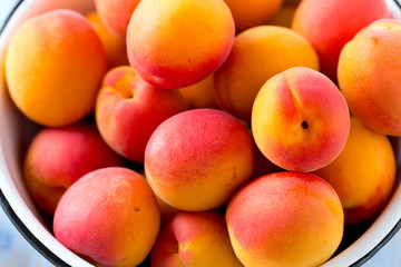 apricots on wooden surface
