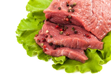 Fresh raw meat on a white background.