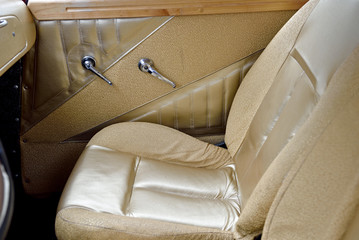 door handles and chair in vintage cars in the style of glamor