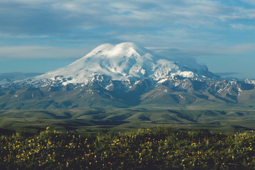 Fototapeta premium Mount Elbrus in the morning rays of the sun
