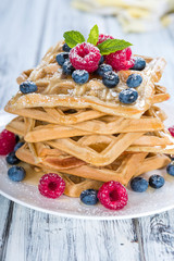 Fresh made Waffles with mixed Berries and Honey