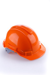 Fototapeta premium orange safety helmet hard hat, tool protect worker of danger