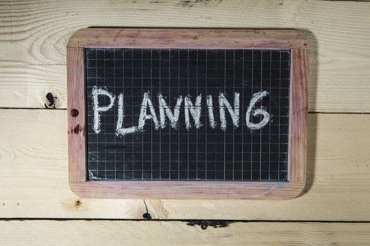 Lavagna con scritta planning