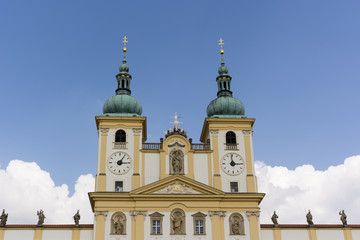 Fototapeta na wymiar Two church belfry and blue sky in the background