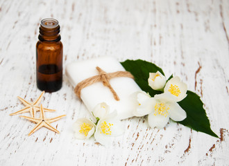 essential oil and soap with jasmine flower