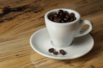 Coffe beans in espresso cup