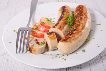grilled white sausage with apple