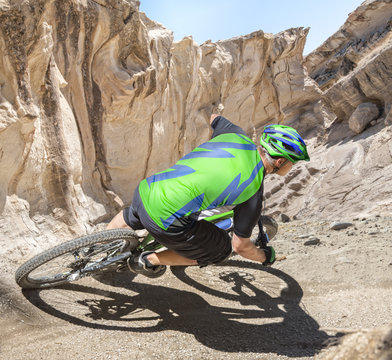 Mountain biker riding canyon