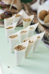 Natural food: worms in bags on the board